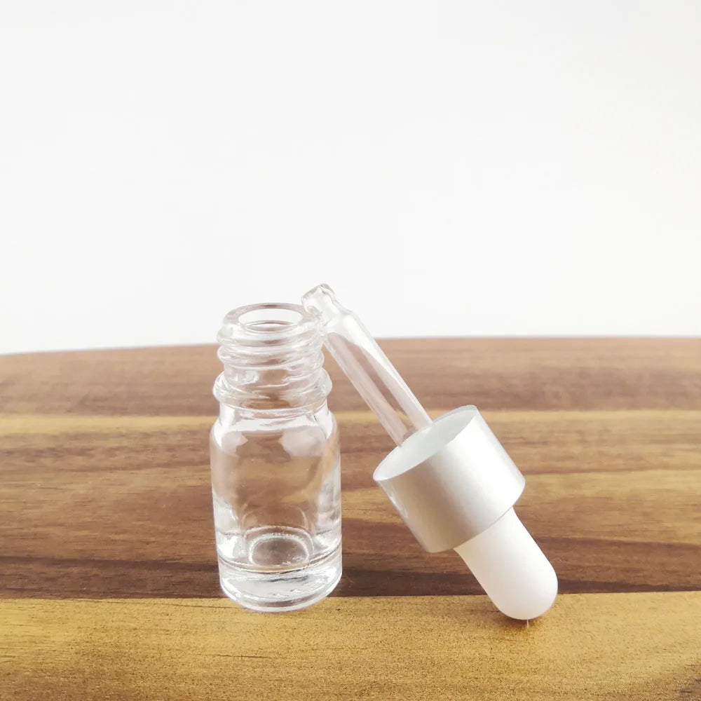 Nachfüllbare Tropfflasche/Pipette aus klarem Glas mit silberner Kappe zum Nachfüllen von Massageölen, Aromatherapie-Flüssigkeit, Essenz/Serum, Hautpflege