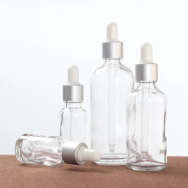 Nachfüllbare Tropfflasche/Pipette aus klarem Glas mit silberner Kappe zum Nachfüllen von Massageölen, Aromatherapie-Flüssigkeit, Essenz/Serum, Hautpflege