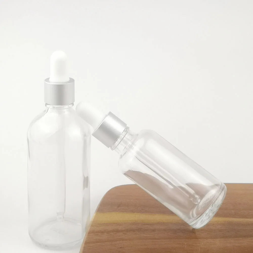 Nachfüllbare Tropfflasche/Pipette aus klarem Glas mit silberner Kappe zum Nachfüllen von Massageölen, Aromatherapie-Flüssigkeit, Essenz/Serum, Hautpflege