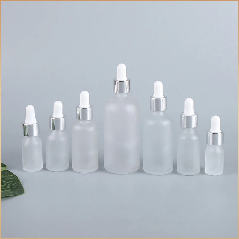 Nachfüllbare Tropfflasche/Pipette aus klarem Glas mit silberner Kappe zum Nachfüllen von Massageölen, Aromatherapie-Flüssigkeit, Essenz/Serum, Hautpflege