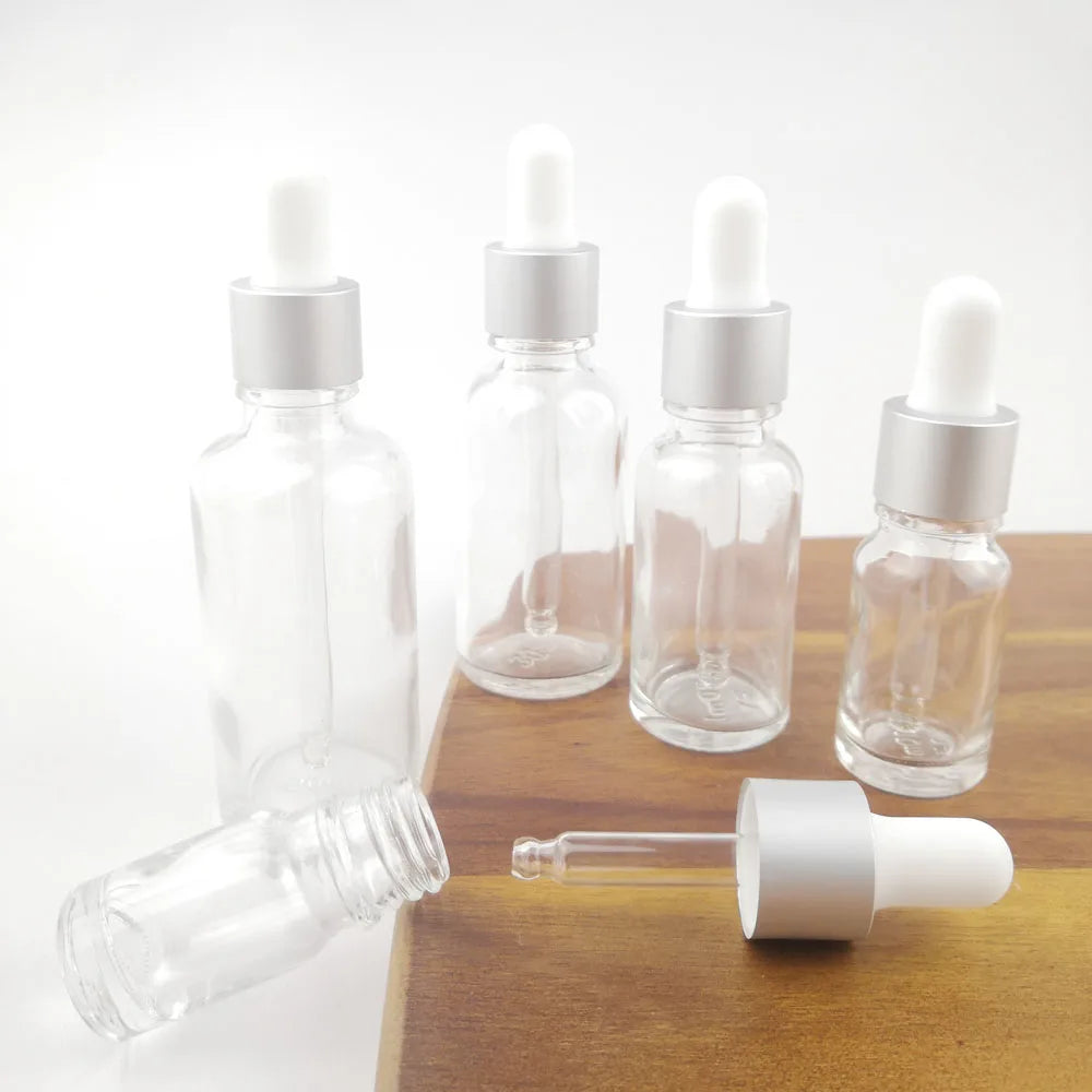 Nachfüllbare Tropfflasche/Pipette aus klarem Glas mit silberner Kappe zum Nachfüllen von Massageölen, Aromatherapie-Flüssigkeit, Essenz/Serum, Hautpflege